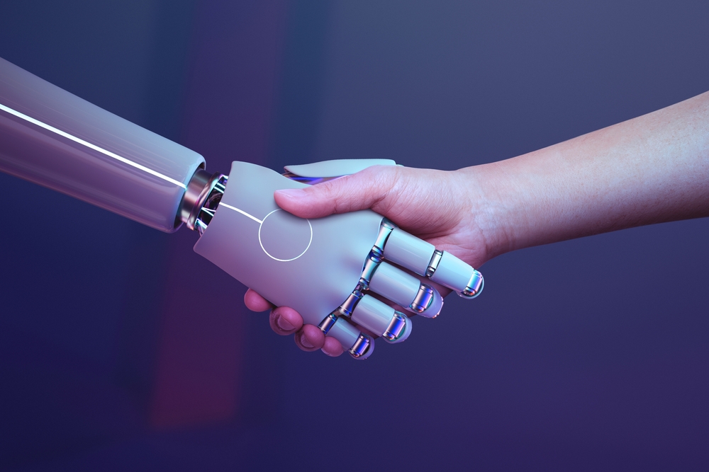 Mains robot et humaine