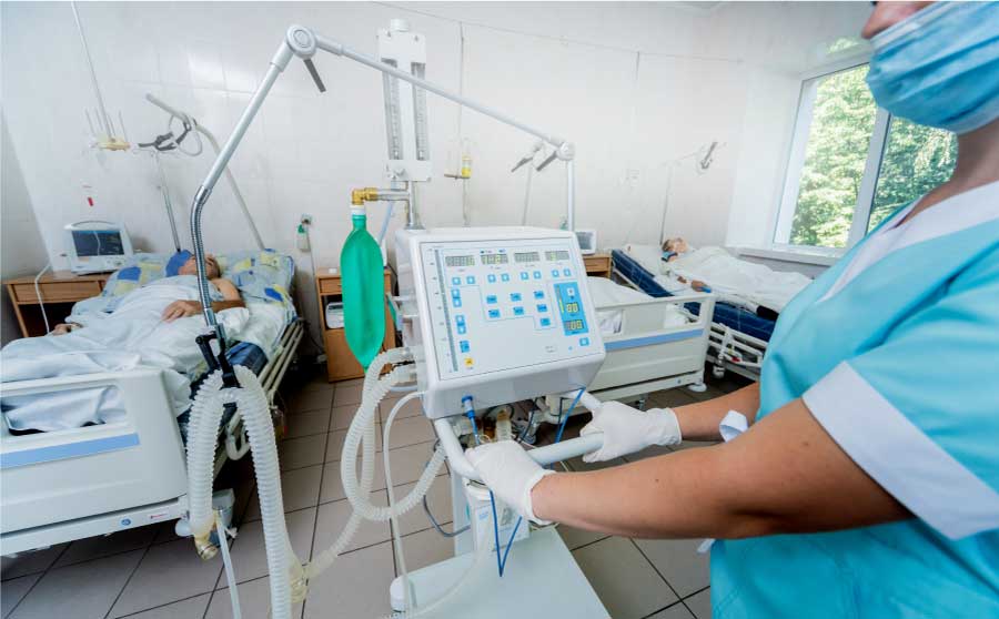 Nurse applies her learning with a portable Patient Monitor system.